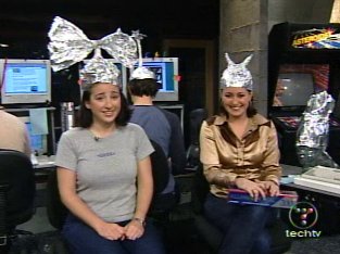 Megan Morrone and Cat Schwartz protect themselves from brainwave intrusion